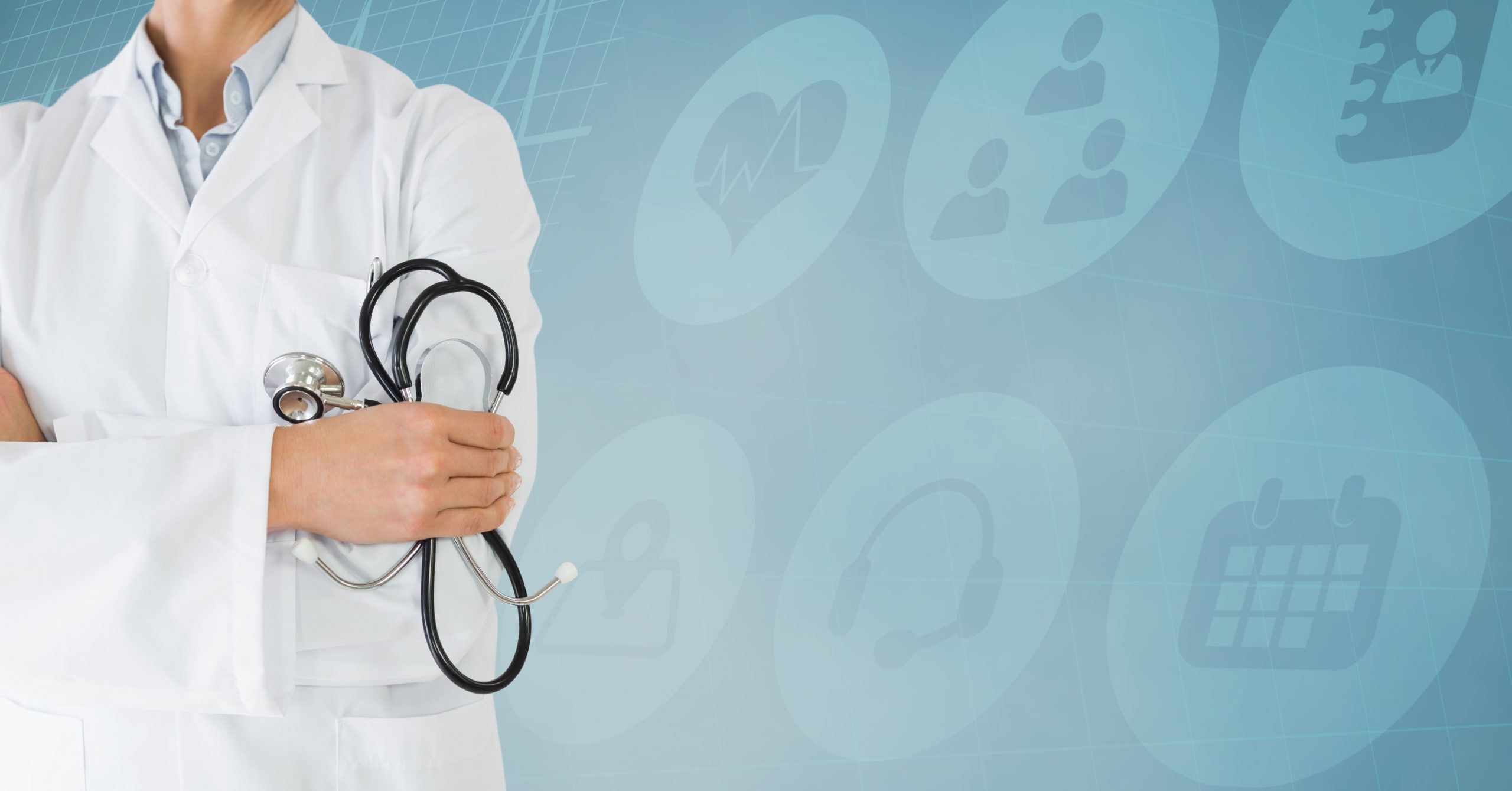 A doctor standing in front of a healthcare practice management banner