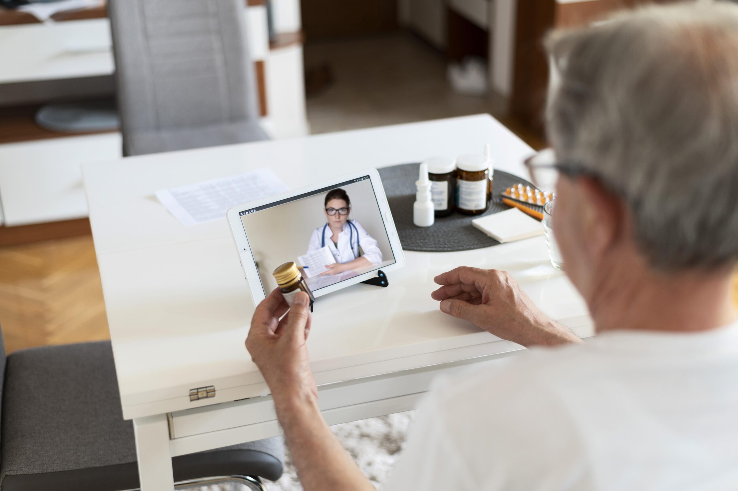 Close up an old man on a Telehealth consultation