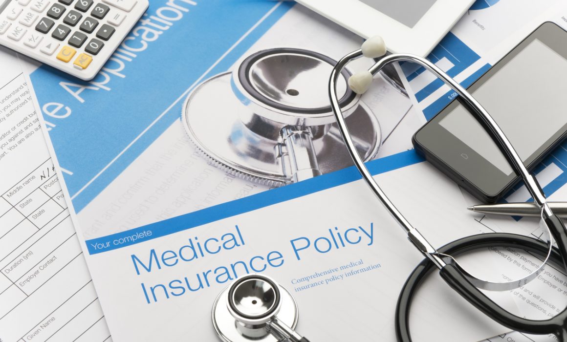 Medical Aid Claim and Billing Documents under a Stethoscope