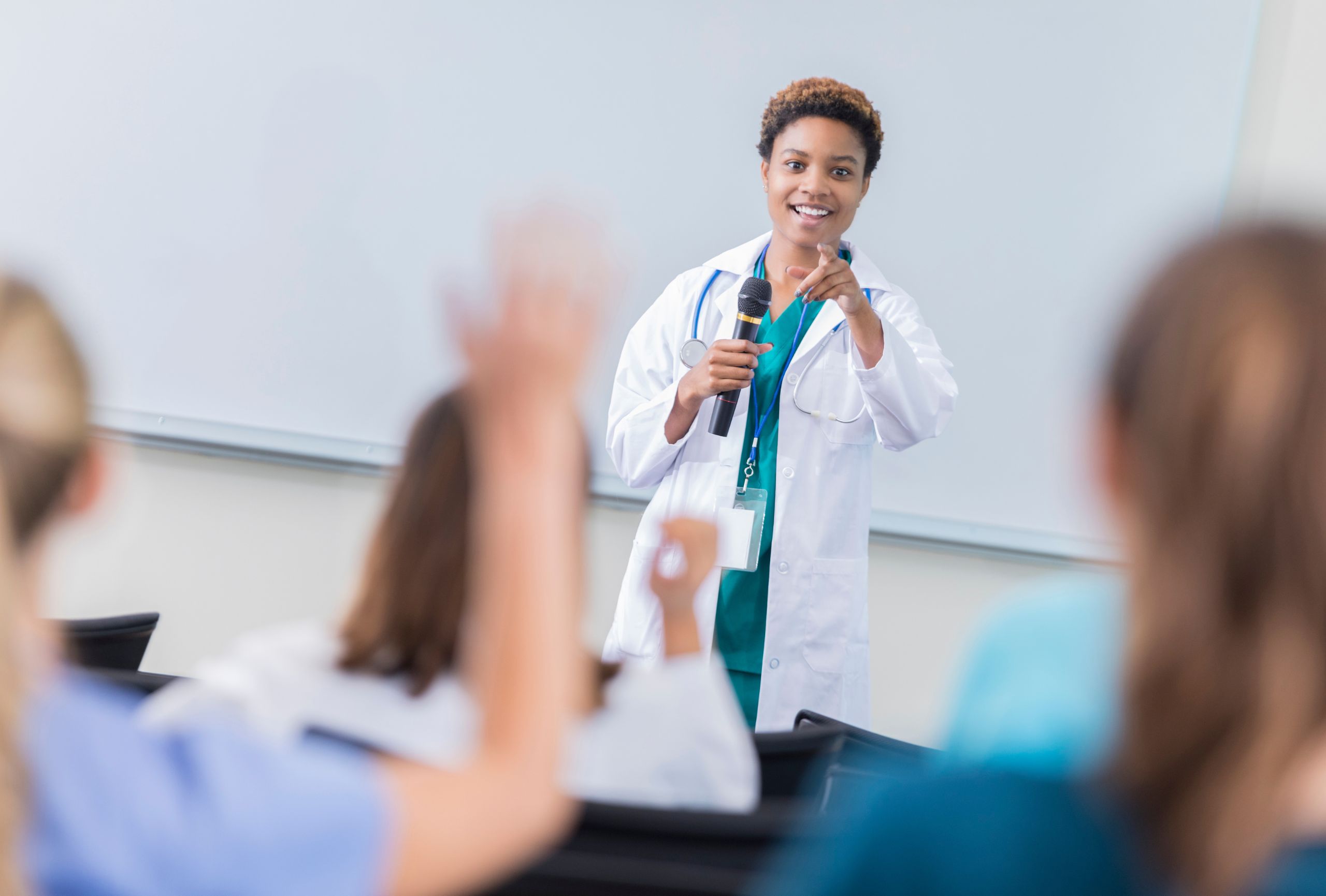 Doctor Answering Questions after Giving a Lecture